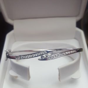 Woman bracelet 14 carat wh gold, 1 car diamonds